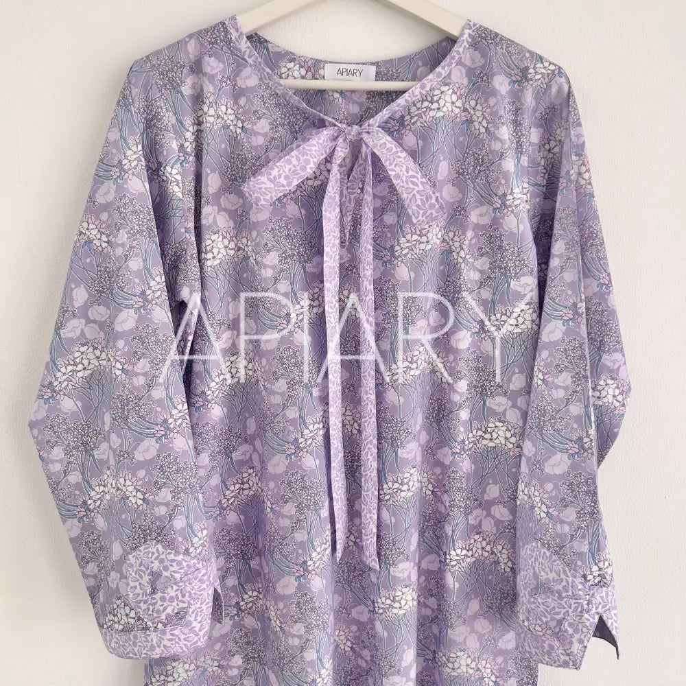 
                  
                    Grace in Liberty Purple Flowers
                  
                