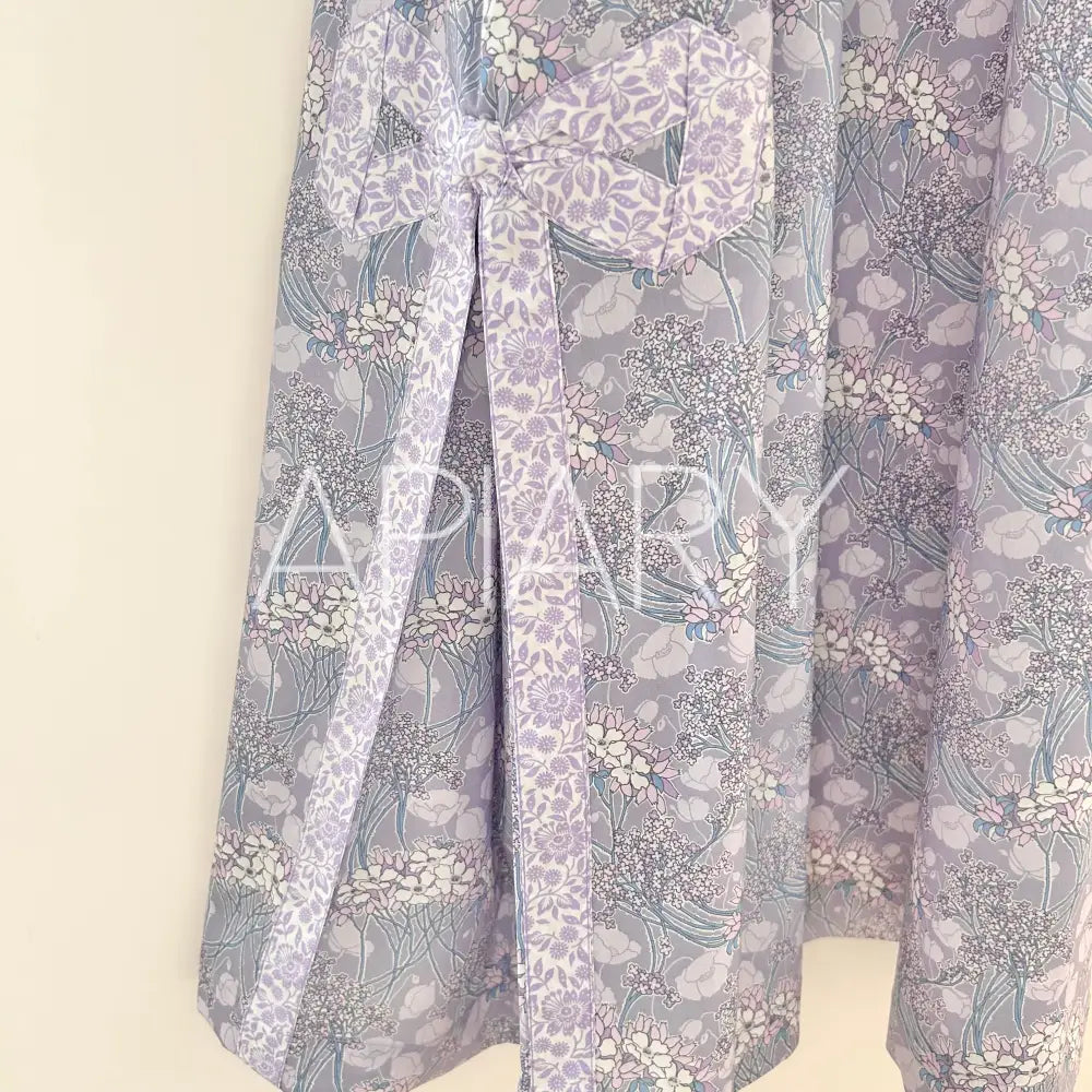 
                  
                    Grace in Liberty Purple Flowers
                  
                