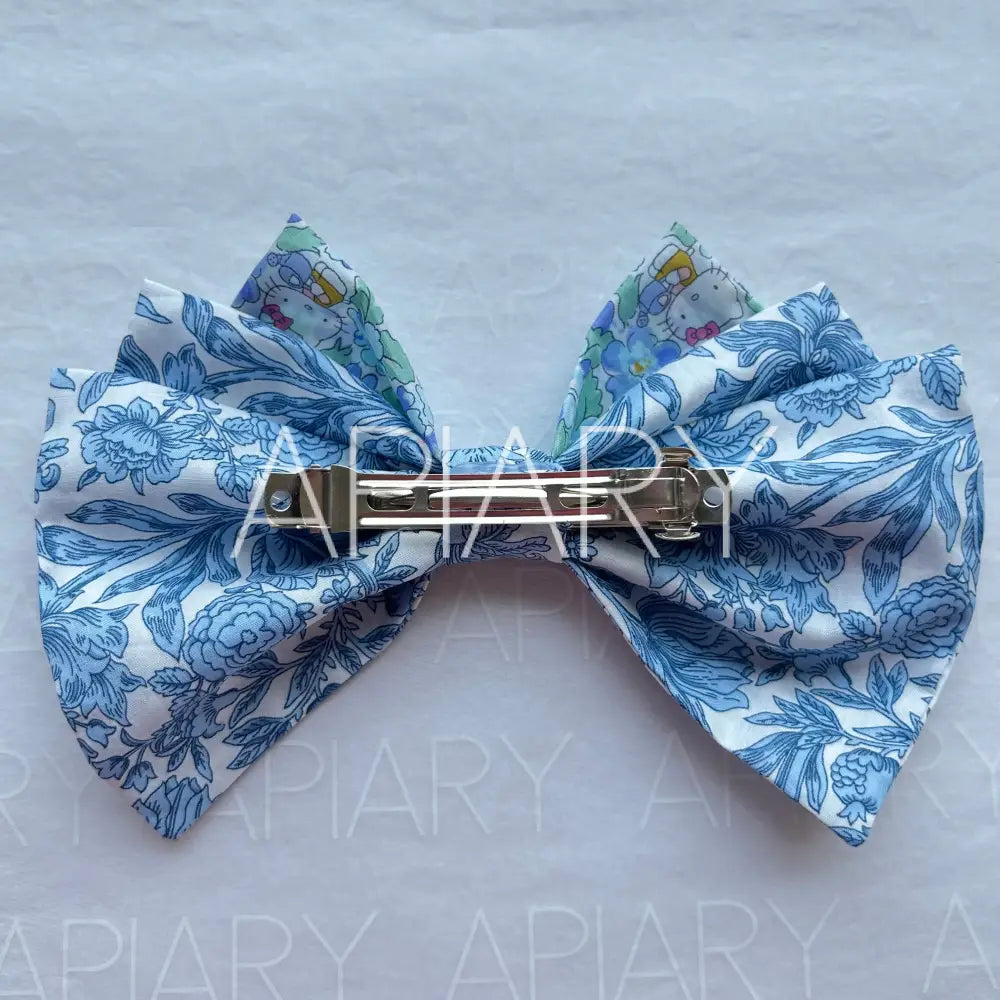 
                  
                    Liberty Sambourne Blue Bow Hairclip
                  
                