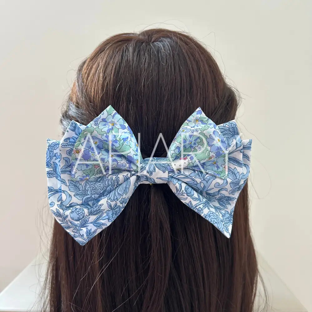 
                  
                    Liberty Sambourne Blue Bow Hairclip
                  
                